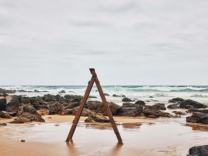 Wooden ladder on a beach